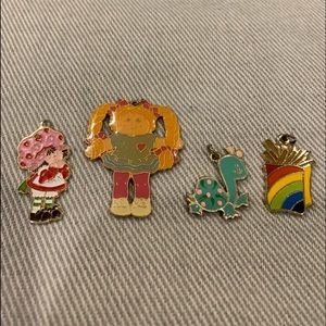 Four Vintage Children's Enameled Pendants
